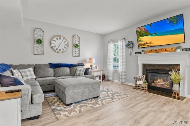 111 Aegean Ave, Amherst, NY 14228 - living area with wood finished floors and a fireplace with flush hearth