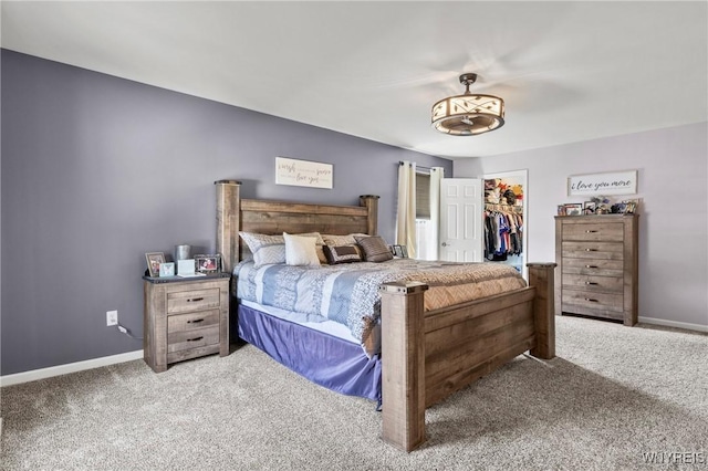 111 Aegean Ave, Amherst, NY 14228 - carpeted bedroom featuring a walk in closet and a closet