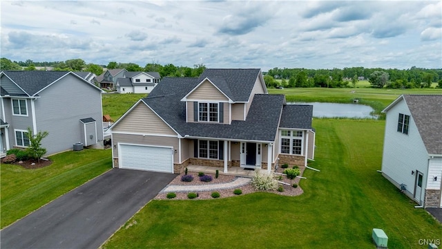 3427 Tall Tree Ln, Lysander, NY 13027 - traditional-style house with stone siding, a porch, an attached garage, asphalt driveway, and roof with shingles