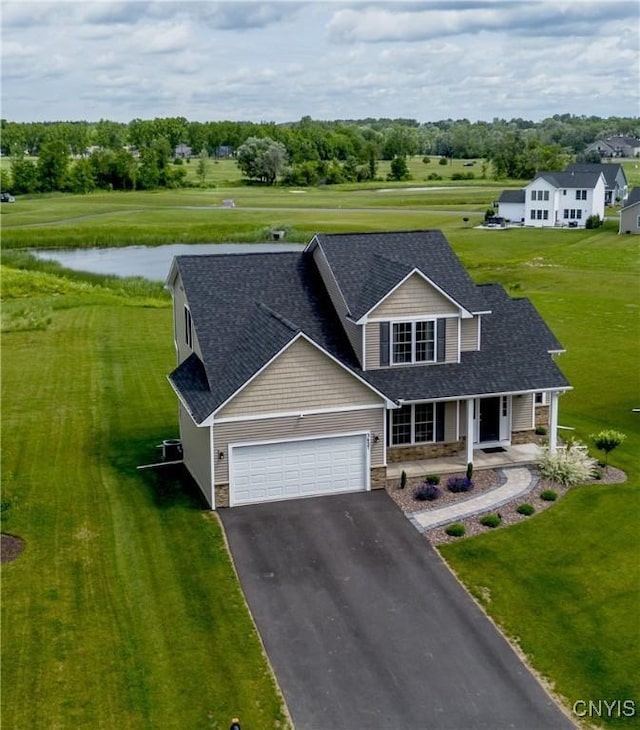 3427 Tall Tree Ln, Lysander, NY 13027 - view of front of house with stone siding, covered porch, asphalt driveway, and an attached garage