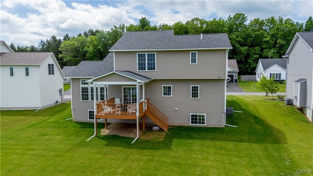 3427 Tall Tree Ln, Lysander, NY 13027 - rear view of property with a deck, a lawn, stairway, and a shingled roof