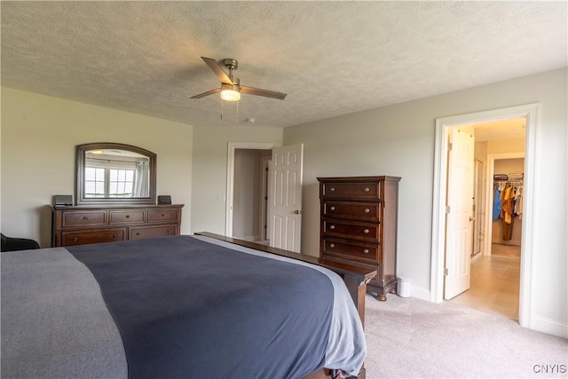 3427 Tall Tree Ln, Lysander, NY 13027 - carpeted bedroom with a ceiling fan and a textured ceiling