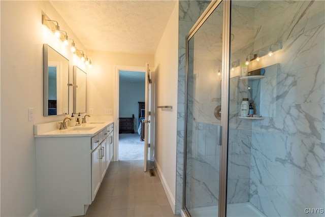3427 Tall Tree Ln, Lysander, NY 13027 - bathroom featuring double vanity, a marble finish shower, and a textured ceiling