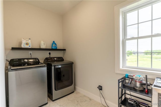 3427 Tall Tree Ln, Lysander, NY 13027 - laundry area featuring separate washer and dryer and light marble finish floors