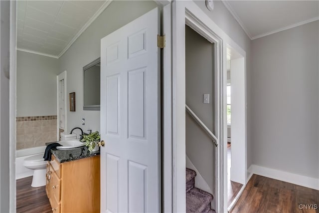 713 Parham St, Wilna, NY 13619 - full bathroom with vanity, crown molding, wood finished floors, and a tub to relax in