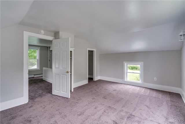 713 Parham St, Wilna, NY 13619 - bonus room featuring vaulted ceiling, a baseboard heating unit, carpet flooring, and plenty of natural light