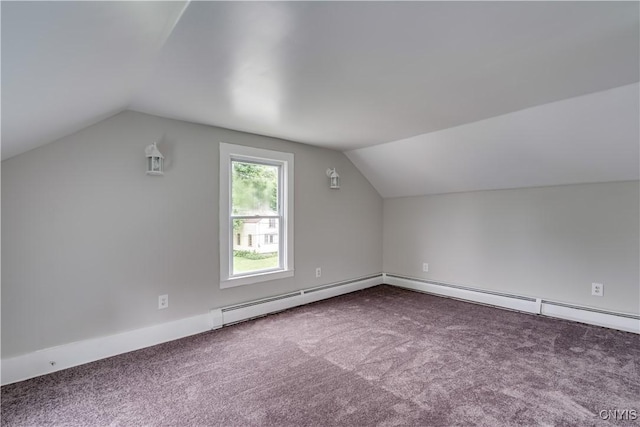 713 Parham St, Wilna, NY 13619 - bonus room featuring vaulted ceiling, carpet flooring, and a baseboard heating unit