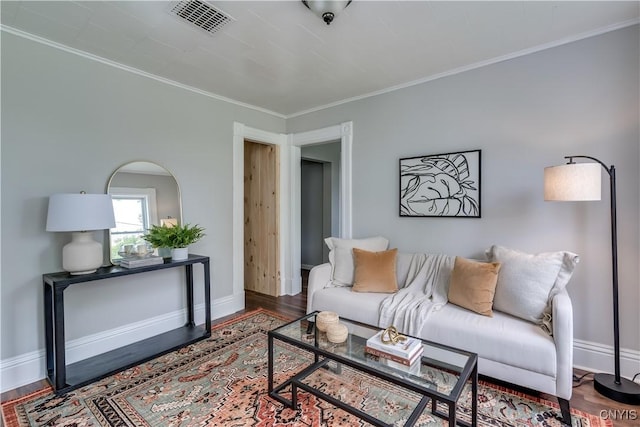 713 Parham St, Wilna, NY 13619 - living room featuring wood finished floors and ornamental molding