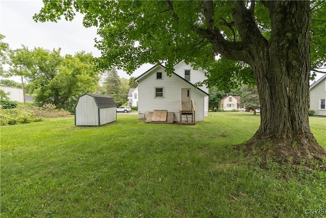 713 Parham St, Wilna, NY 13619 - view of green lawn featuring a storage unit