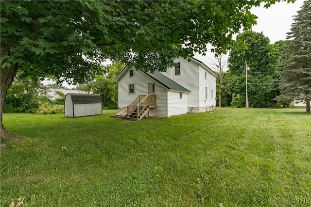 713 Parham St, Wilna, NY 13619 - view of green lawn with a storage shed
