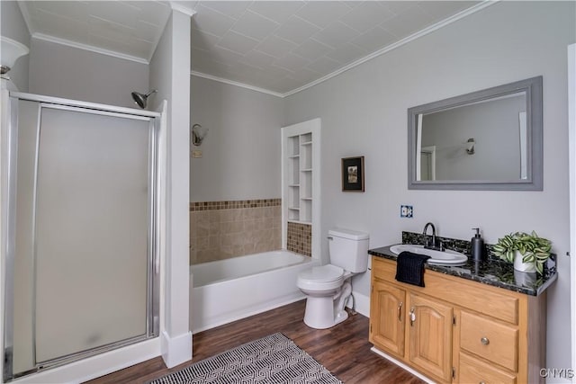 713 Parham St, Wilna, NY 13619 - full bathroom featuring ornamental molding, a stall shower, wood finished floors, vanity, and a bath