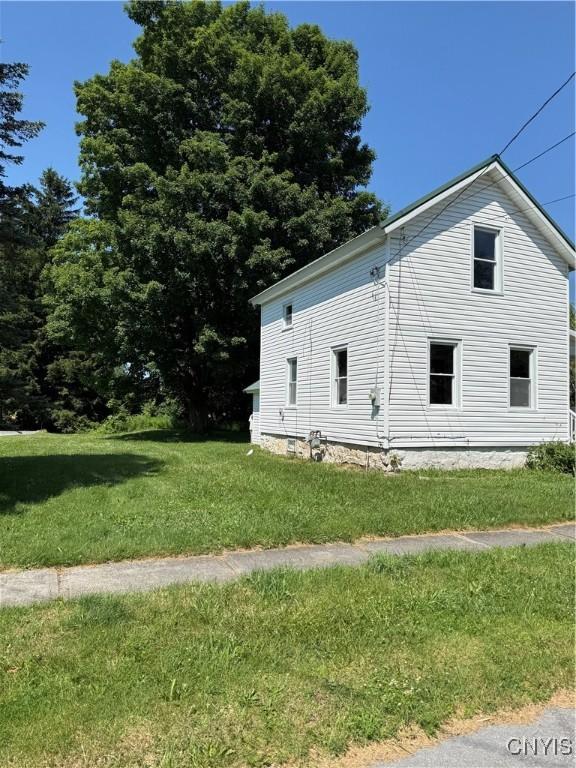 713 Parham St, Wilna, NY 13619 - view of home's exterior with a lawn