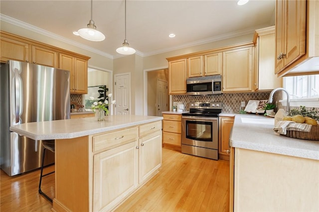 6915 Proximity Ln, Victor, NY 14564 - kitchen with appliances with stainless steel finishes, light brown cabinets, light wood-type flooring, light countertops, and decorative backsplash