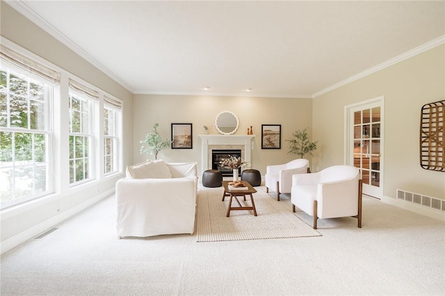 6915 Proximity Ln, Victor, NY 14564 - carpeted living area featuring crown molding and a glass covered fireplace