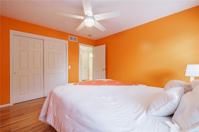 6915 Proximity Ln, Victor, NY 14564 - bedroom with light wood-style floors, a closet, and ceiling fan