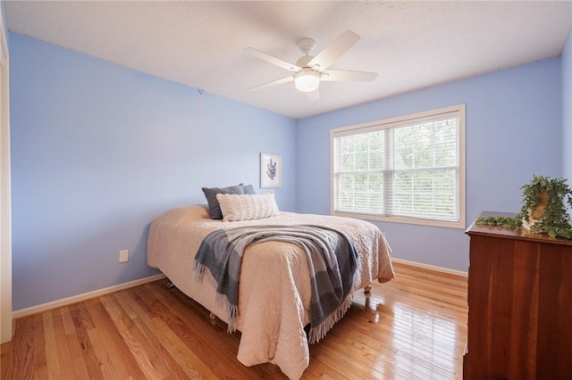 6915 Proximity Ln, Victor, NY 14564 - bedroom with light wood finished floors and ceiling fan