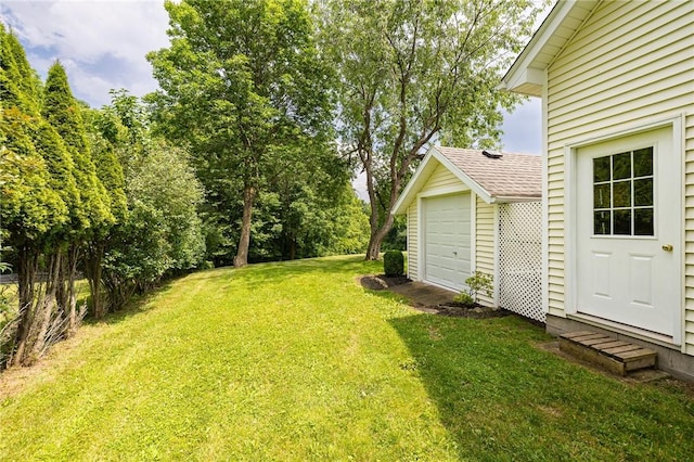 6915 Proximity Ln, Victor, NY 14564 - view of grassy yard with a garage
