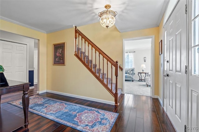 331 Hickory Ln, Hastings, NY 13036 - foyer entrance featuring a chandelier, stairs, ornamental molding, and dark wood-style floors