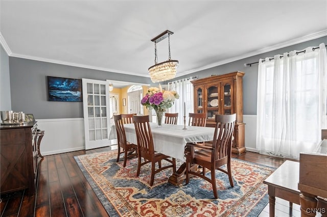331 Hickory Ln, Hastings, NY 13036 - dining space featuring plenty of natural light, crown molding, wainscoting, and dark wood-type flooring