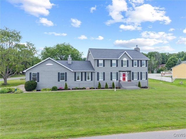 331 Hickory Ln, Hastings, NY 13036 - colonial inspired home with a chimney and a front lawn