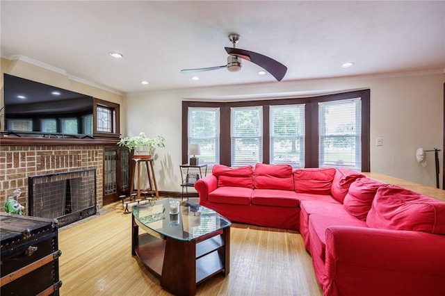108 Iroquois St, Rochester, NY 14609 - living room featuring a ceiling fan, ornamental molding, wood finished floors, a fireplace, and recessed lighting
