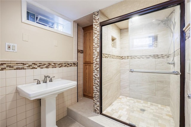108 Iroquois St, Rochester, NY 14609 - full bathroom with a shower stall and tile walls