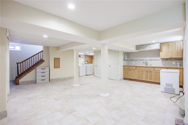 108 Iroquois St, Rochester, NY 14609 - unfurnished living room featuring stairway, separate washer and dryer, and recessed lighting