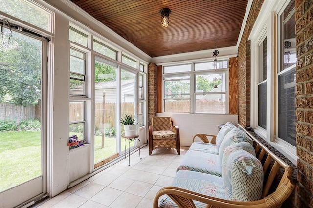 108 Iroquois St, Rochester, NY 14609 - sunroom featuring tile patterned floors, wooden ceiling, brick wall, and ornamental molding