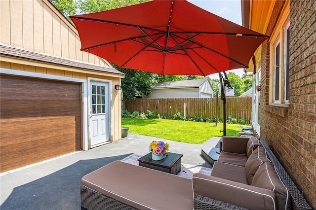 108 Iroquois St, Rochester, NY 14609 - fenced backyard with a patio area and an outdoor hangout area