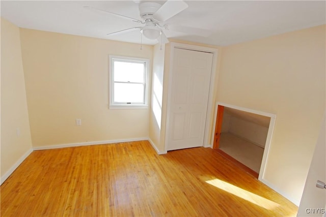 32 Franklin St, Champion, NY 13619 - unfurnished bedroom with light wood-type flooring, a ceiling fan, and a closet