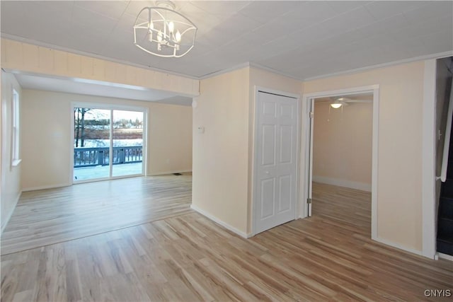 32 Franklin St, Champion, NY 13619 - unfurnished room featuring a chandelier and light wood finished floors