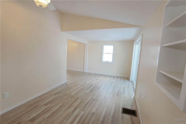 32 Franklin St, Champion, NY 13619 - spare room with wood finished floors and vaulted ceiling