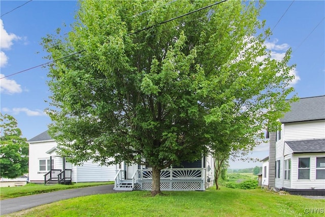 32 Franklin St, Champion, NY 13619 - view of front facade featuring a front lawn