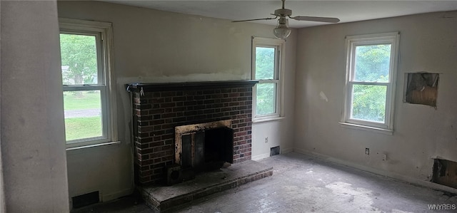 76 Deacon Rd, Orchard Park, NY 14127 - unfurnished living room with healthy amount of natural light, a brick fireplace, and ceiling fan