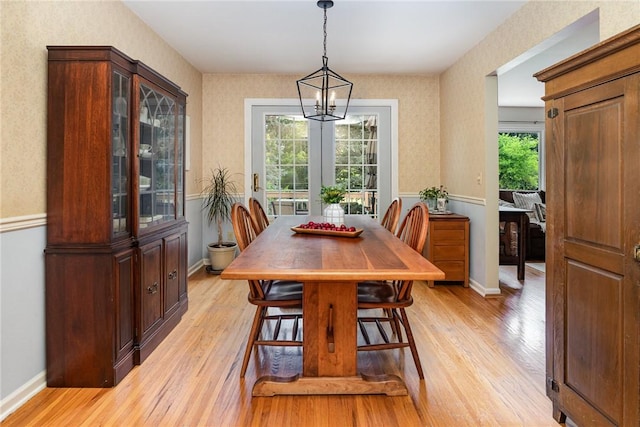 500 Watson Rd, Perinton, NY 14450 - dining room featuring light wood-type flooring and wallpapered walls