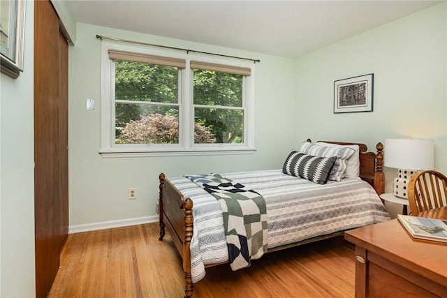 500 Watson Rd, Perinton, NY 14450 - bedroom featuring wood finished floors and baseboards