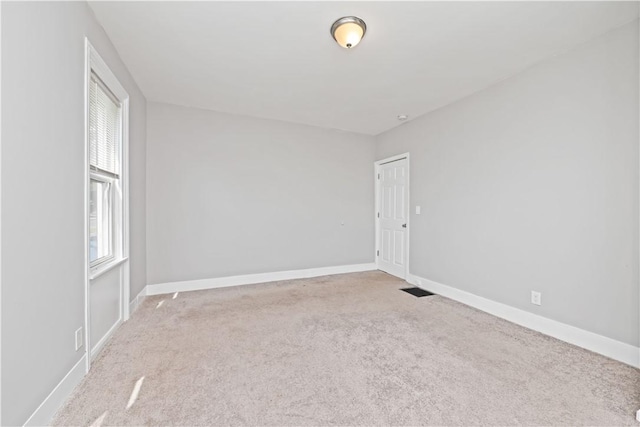 1084 Plymouth Ave S, Rochester, NY 14608 - carpeted spare room with baseboards