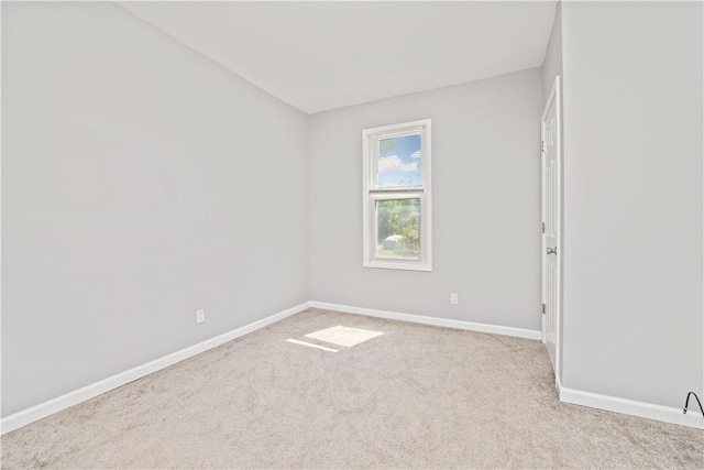 1084 Plymouth Ave S, Rochester, NY 14608 - carpeted spare room featuring baseboards