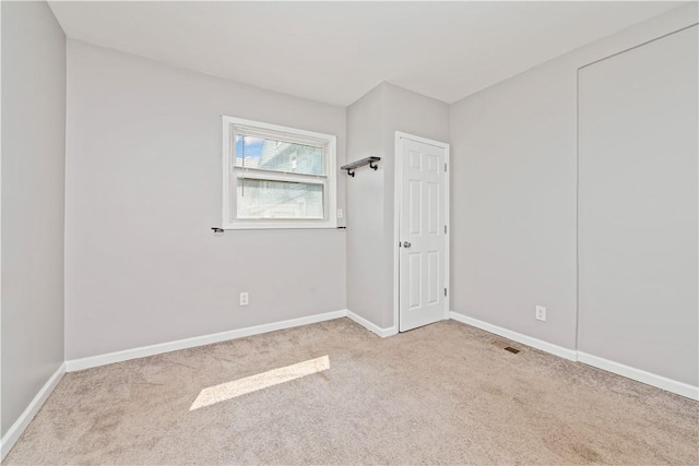 1084 Plymouth Ave S, Rochester, NY 14608 - unfurnished bedroom with carpet flooring and baseboards