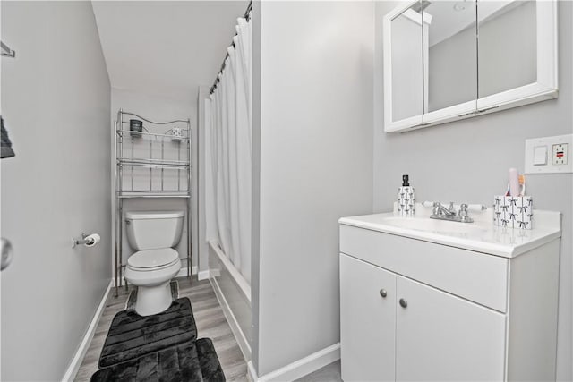 1084 Plymouth Ave S, Rochester, NY 14608 - full bathroom with wood finished floors, vanity, and shower / bathtub combination with curtain