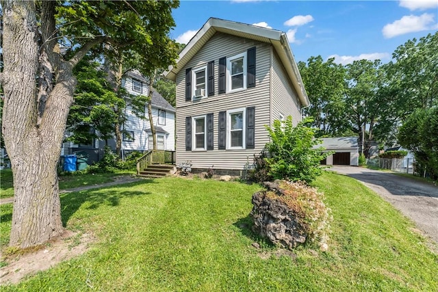 1084 Plymouth Ave S, Rochester, NY 14608 - view of front facade with a front lawn and an outbuilding
