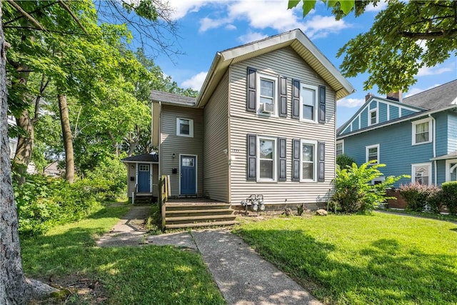 1084 Plymouth Ave S, Rochester, NY 14608 - traditional-style house featuring a front yard