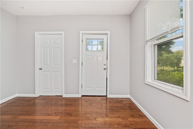 1084 Plymouth Ave S, Rochester, NY 14608 - foyer entrance featuring baseboards and dark wood finished floors