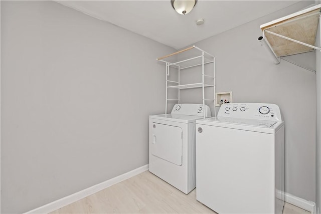 1084 Plymouth Ave S, Rochester, NY 14608 - washroom with independent washer and dryer and baseboards