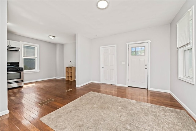 1084 Plymouth Ave S, Rochester, NY 14608 - foyer entrance with dark wood finished floors and baseboards