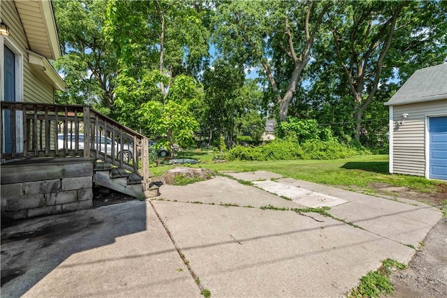 1084 Plymouth Ave S, Rochester, NY 14608 - view of patio / terrace featuring view of wooded area