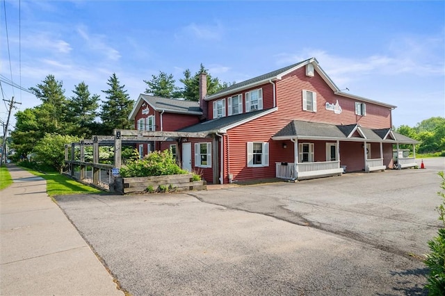 1369 Pittsford Mendon Rd, Mendon, NY 14506 - view of front facade with a porch