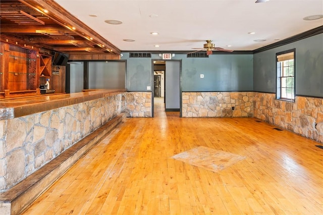1369 Pittsford Mendon Rd, Mendon, NY 14506 - spare room featuring wainscoting, hardwood / wood-style floors, a ceiling fan, and crown molding
