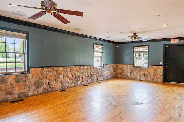 1369 Pittsford Mendon Rd, Mendon, NY 14506 - unfurnished room with a ceiling fan, ornamental molding, wainscoting, wood finished floors, and recessed lighting