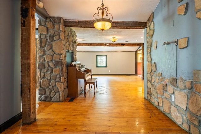 1369 Pittsford Mendon Rd, Mendon, NY 14506 - corridor featuring hardwood / wood-style floors and beam ceiling